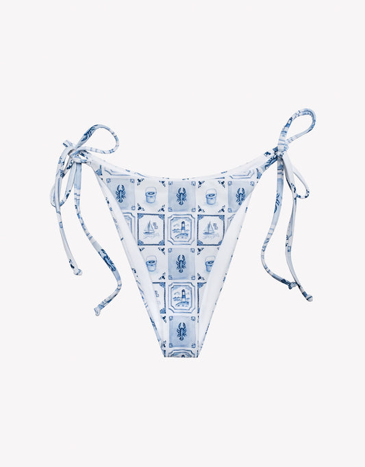 Blue and white patterned bikini bottom on a white background.