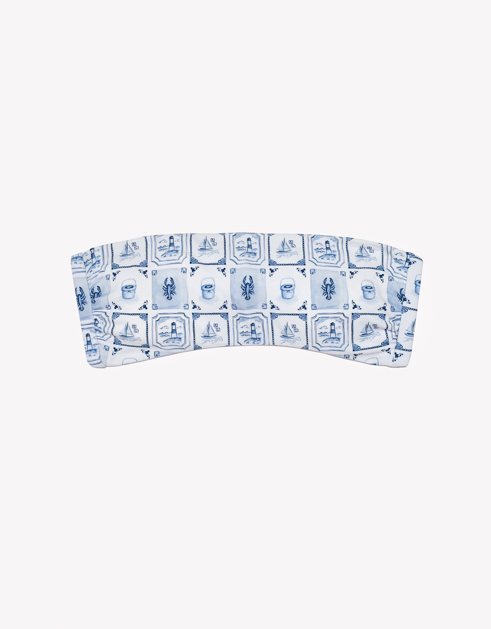 Bandeau top with blue and white pattern on a white background.