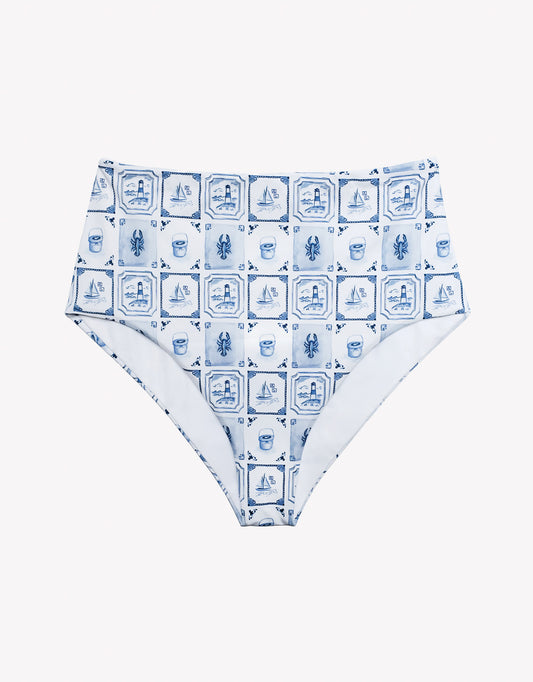 Blue and white patterned swim bottom on a white background.